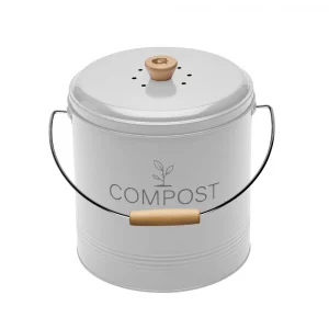 seau à compost davec filtre blanc au design retro avec une poignée en bois avec un G pour la marque Guillouard